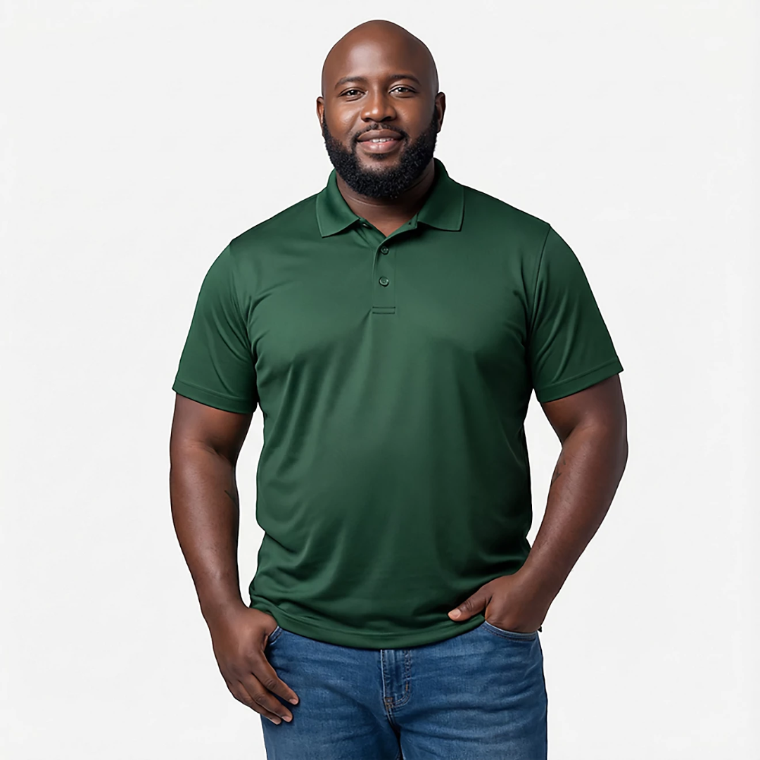 Man wearing a green polo shirt and blue jeans on a white background