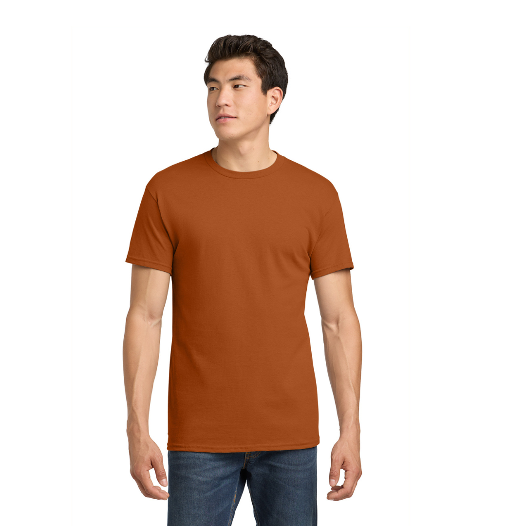 Man wearing a brown t-shirt and blue jeans on a white background