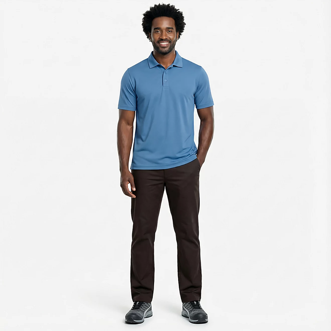 Man wearing a blue polo shirt and dark pants on a white background
