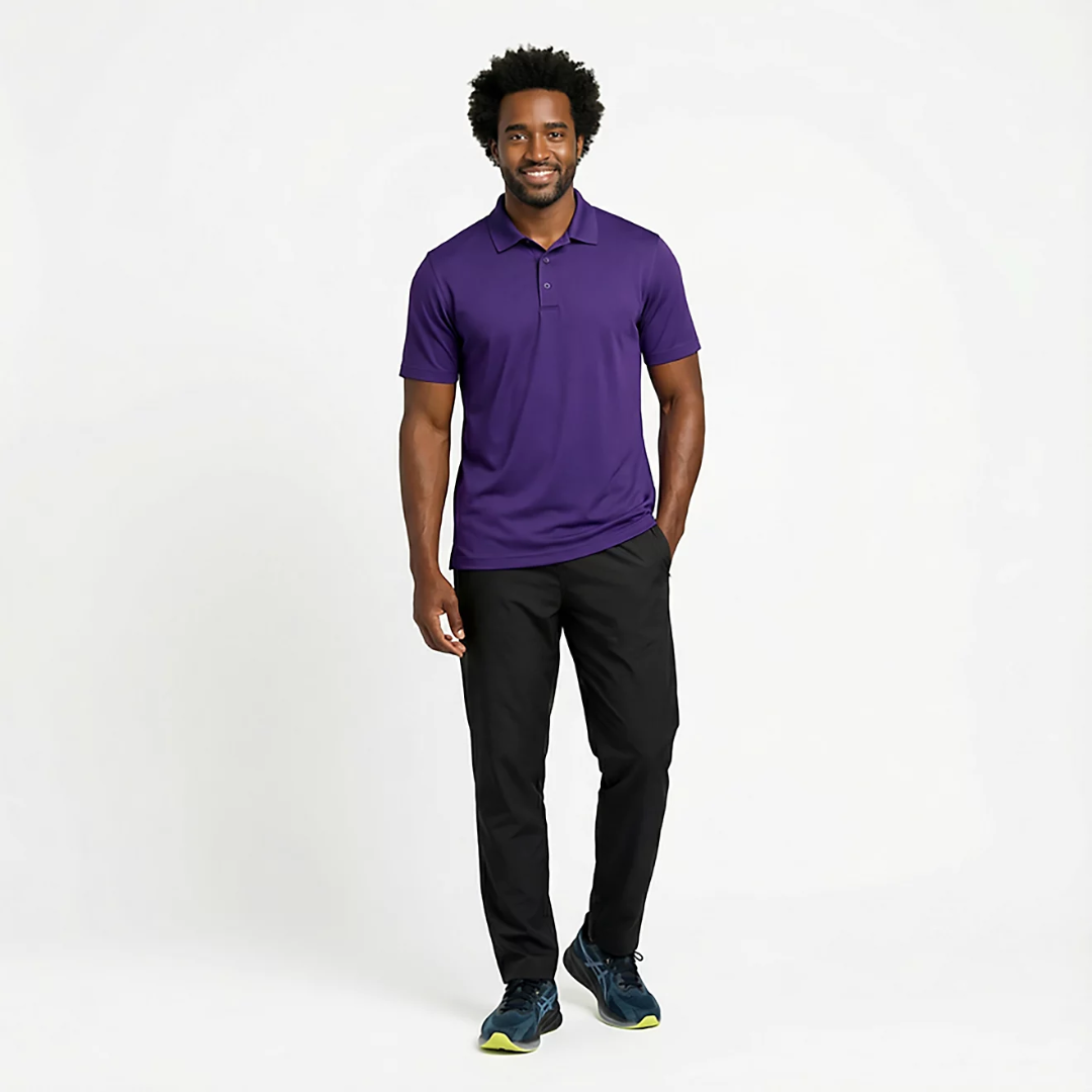 Man wearing a purple polo shirt and black pants on a white background