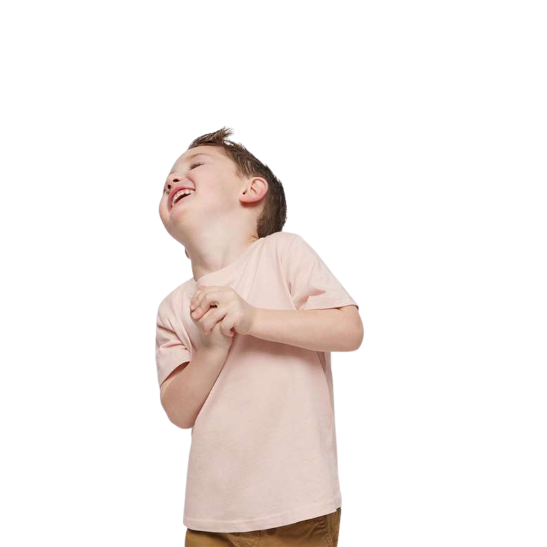 Child wearing a light pink t-shirt on a white background